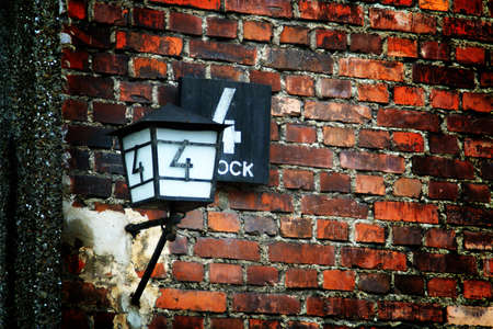Lamppost at the entrance of barracks number 4 in the concentration camp of Auschwitz I.