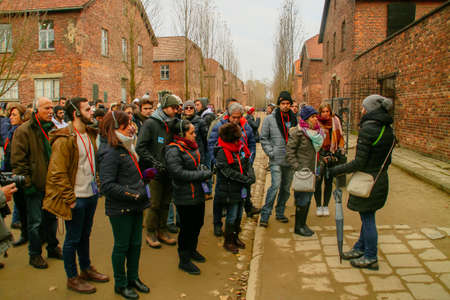 Auschwitz I concentration camp (in Oswiecim, Poland). Tourists visiting the concentration camp.のeditorial素材