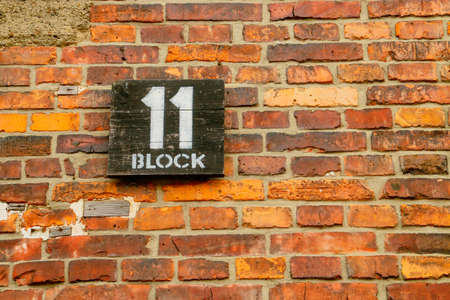Number at the entrance of the barracks number 11 in the concentration camp of Auschwitz I, Poland.
