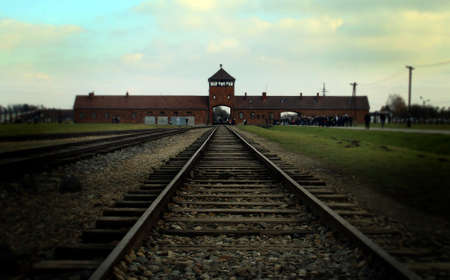 Auschwitz-Birkenau concentration camp in Oswiecim, Poland. The entrance known as Death Gate where...