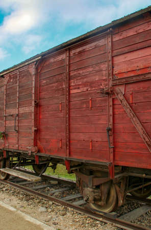 Auschwitz-Birkenau concentration camp. Red train carriage in the concentration camp of Auschwitz-Birkenau in Oswiecim.のeditorial素材