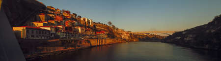 Porto / Portugal; 01/19/2017. Gustave Eiffel avenue (Ribeira neighborhood), Infante bridge and the river Douro in Porto at sunset.のeditorial素材