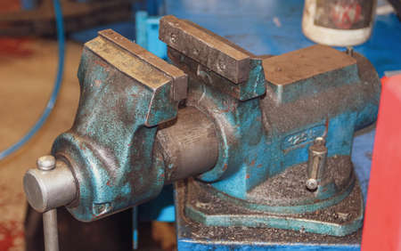 Dirty bench vise in a mechanical workshop in Madrid, Spain.の写真素材