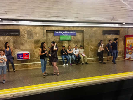 Madrid / Spain; 06/20/2018. People waiting on the platform of the Santiago Bernab?u underground station, line 10, in Madrid.のeditorial素材