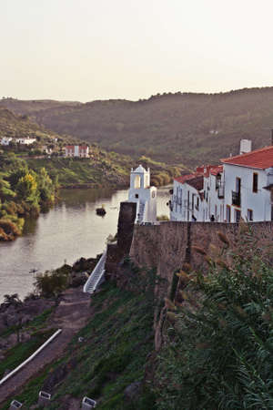 The tower of the clock in Mertola, Portugal.の写真素材