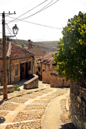 Cobblestone street of a town of Spain, in Sepulveda, Segovia, Spain)