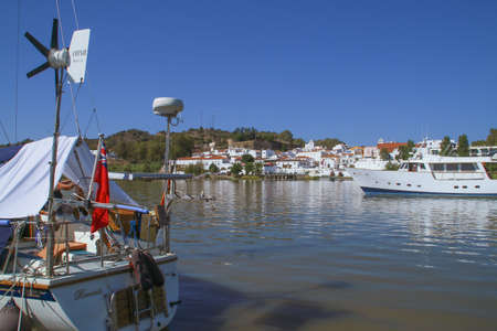 Alcoutim / Portugal; 08/19/2018. View of the border town of Alcoutim (Portugal) from the Sanl?car de Guadiana marina in Spain.のeditorial素材