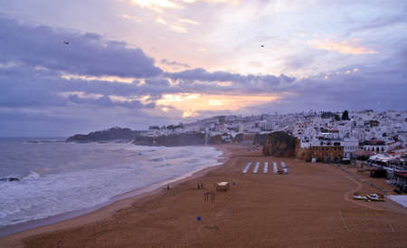 Albufeira / Portugal; 10/20/2015. Sunset in the beach of Albufeira, Algarve, Portugal. Panoramic View.のeditorial素材