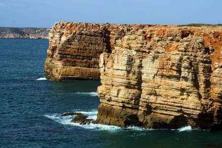 Cliffs and water of the Cape San Vicente in the south of Portugal, Algarve.
