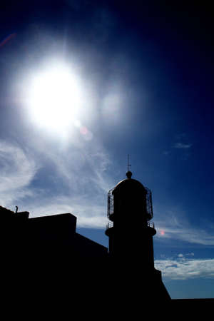 Backlight of the Lighthouse of the Cape of San Vicente in the south of Portugal. Sagres, Algarve, Portugal.の写真素材