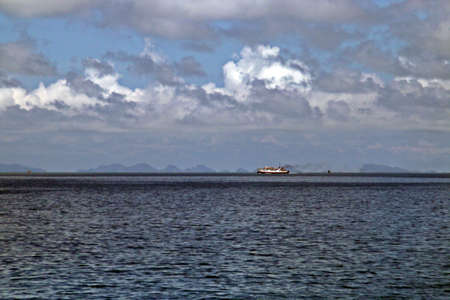 Ferry in open waters. Sea of the Gulf of Thailand. The immense Pacific in the open waters of the...