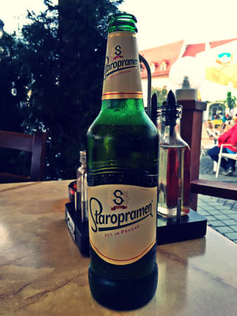 Sibiu / Romania; 06/29/2018. Staropramen beer bottle. Beer whose origin is in the Czech Republic.のeditorial素材