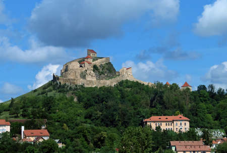 Rupea Citadel seen from the E60 road in Romania. The citadel is located on top of the Cohalmului hill, located in the northern part of the city of Rupea.のeditorial素材
