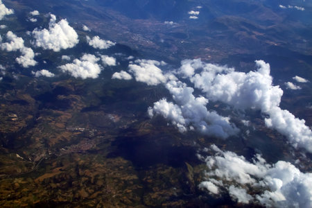 Clouds over the Abruzzo region in Italy. Aerial view from the window of a commercial flight.の写真素材