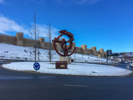 Avila, Spain; 02 10 2018. Monument to the bicycling and the Medieval Wall in Ãvila. Winter day...