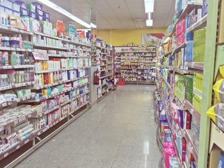 Madrid, Spain. 11 11 2018. Shelves with a multitude of products in a supermarket. Feminine hygiene products in a supermarket of the Supercor Expres chain.のeditorial素材
