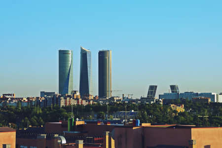 Madrid, Spain; 10 04 2018. The known as "Cuatro Torres Business Area" of Madrid. The skyscrapers of Madrid seen from the north at sunset.のeditorial素材