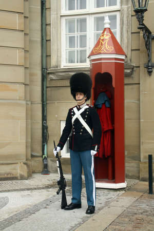 Copenhagen, Denmark; 02 14 2016. Guard in Amalienborg Palace, Copenhagen. The Royal Guard Company of Denmark is an active protection force for the Danish royal family.のeditorial素材