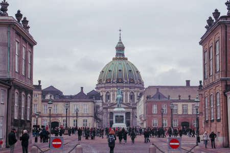 Copenhagen, Denmark; 02 14 2016. Frederik's Church and tourists waiting for the ceremony of the changing the guard in Copenhagen. It is popularly known as The Marble Church for its Rococo architectureのeditorial素材