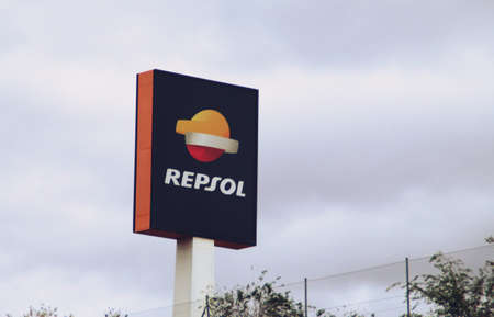Alcobendas, Spain. 10 27 2018. REPSOL service station on the A1 motorway. Logo of the multinational oil company on a cloudy day.のeditorial素材