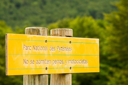 Borce, France; 06 15 2016. Sign in Pyrenees National Park. Parc National des PyrÃ©nÃ©es; National Park of the Pyrenees. Dogs and motorcycles are not allowed; Dogs and motorcycles are not allowed.のeditorial素材