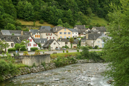 Sarrance (small town in the French Pyrenees) and the Aspe river. Houses of traditional architecture...