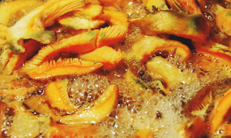 Lactarius deliciosus sliced and cooked with olive oil, commonly known as saffron milk cap and red pine mushroom. It is used in Spanish cuisine. Niscalo is the Spanish name.の写真素材