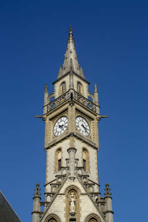 The clocktower of the Former Post Office in a sunny day, Ghent, Belgium. In 1909, the old post office building was built on what was a busy junction for access roads into the city.の写真素材