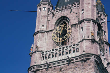 The belfry of Ghent an old medieval tower in the old city center of Ghent, Belgium. The tallest medieval tower overlooking the old town of Ghent and the tallest belfry in Belgium.の写真素材