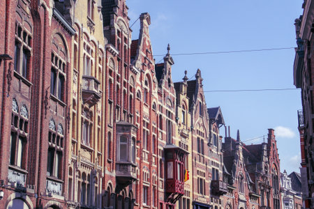 Facades of buildings in Vrijdagmarkt (English: Friday Market), a city square of Ghent, Belgium. Historical and traditional facades of the houses of Ghent.の写真素材