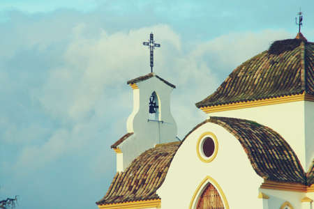 Hermitage of the Holy Cross of Paymogo. Catholic religious building located in the countryside near Paymogo, Huelva, Spain. Photograph taken at sunset.の写真素材