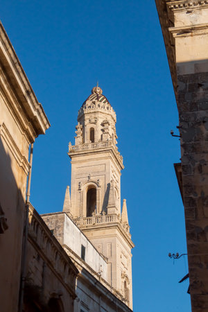 Bell tower of the cathedral of Lecce, Italy, in the square of the same name. Built between 1659 and 1670 by Giuseppe Zimbalo, with five floors and a total height of 70 m.の写真素材
