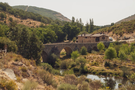 Medieval bridge in Navacepeda de Tormes in Ãvila, Spain. Bridge built to cross the Tormes River.の写真素材