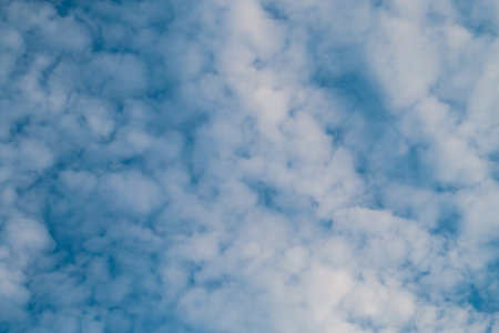 Blue sky background with tiny clouds, nature cloud background. Blue sky with tiny clouds in Las Negras, Spain.の写真素材