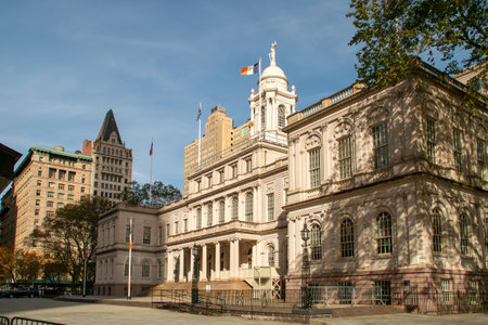 New York City Hall on an autumn morning. Facade of the iconic government building in City Hall Park. Photo from Park Row. 2019.の写真素材