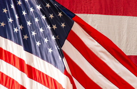 American flag background. Close-up of the American flag displayed at the New York Stock Exchange on Wall Street. USA.の写真素材