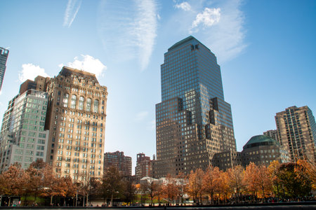 Cityscape of skyscrapers next to ground zero in New York in autumn. The West Street Building skyscraper and to its right the skyscraper 205 Albany Street in November 2019.の写真素材