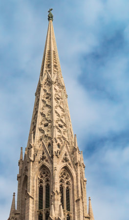 St. Patrick's Cathedral in New York City in autumn, USA. Details of the Gothic-style spire of the cathedral located on Fifth Avenue.の写真素材