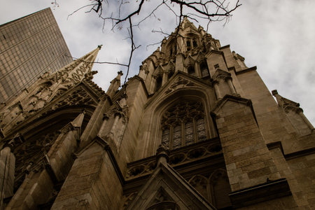 Facade of St. Patrick's Cathedral in New York City in autumn, USA. Architectural details of the Gothic style of the cathedral located on Fifth Avenue.の写真素材