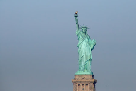 The Statue of Liberty, Liberty Enlightening the World, United States. The famous New York statue located on Ellis Island.の写真素材