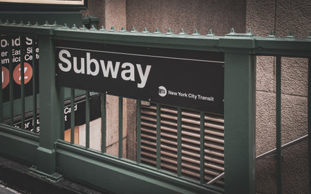 Subway entrance, Broad St. Station, next to 35 Broad St. in Manhattan, New York, USA. Access to the New York City subway's underground stairs.の写真素材