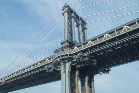 Architectural details of the Manhattan Bridge from Main Street Park in Brooklyn. Views of the arches...