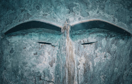 Details of a mask from the tribes of Oceania. Close-up detail of an ancient wooden mask.の写真素材