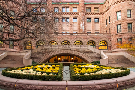 Garden with flowers and trees in their autumn colors in New York City, USA. Entrance to the American Museum of Natural History building at 7 W 77th.の写真素材