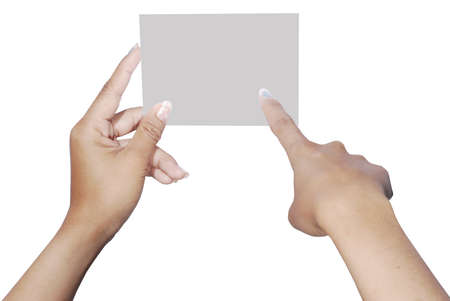 right hand pointed to a card held by the left handの写真素材