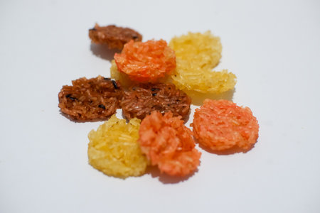 various colorful raw Rengginang is a traditional Indonesian cracker made from sticky rice with a...
