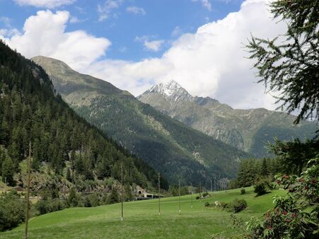 Mountain meadows and peaks near Scuol, Lower Engadine, Switzerlandの写真素材