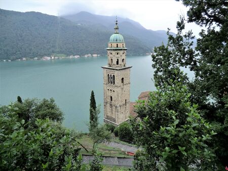 Santa Maria del Sassa church and Lake Lugano, Morcote, Switzerlandの写真素材