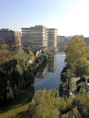 Office building reflected in the River Foss, York, UKの写真素材