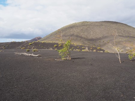 Bleak volcanic landscape in the Timanfaya National Park, Lanzaroteの写真素材
